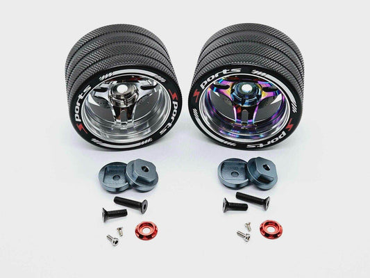 Close-up of the colourful RC transmitter steering wheel showing compatibility with major brands like SANWA, FUTABA, and FLYSKY