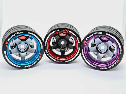 Close-up of the colorful RC transmitter steering wheel showing compatibility with major brands like SANWA, FUTABA, and FLYSKY