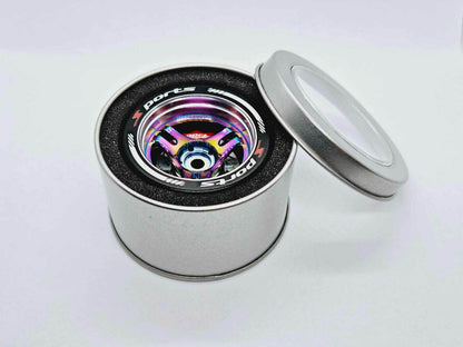 Close-up of the colourful RC transmitter steering wheel showing compatibility with major brands like SANWA, FUTABA, and FLYSKY