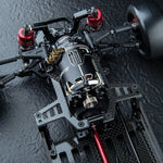 Close-up of MST FRX 2.5mm Carbon Front Bulkhead Deck Set, #210714