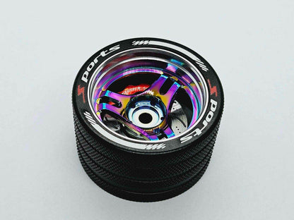 Close-up of the colourful RC transmitter steering wheel showing compatibility with major brands like SANWA, FUTABA, and FLYSKY