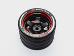 Close-up of the colorful RC transmitter steering wheel showing compatibility with major brands like SANWA, FUTABA, and FLYSKY