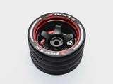 Close-up of the colorful RC transmitter steering wheel showing compatibility with major brands like SANWA, FUTABA, and FLYSKY