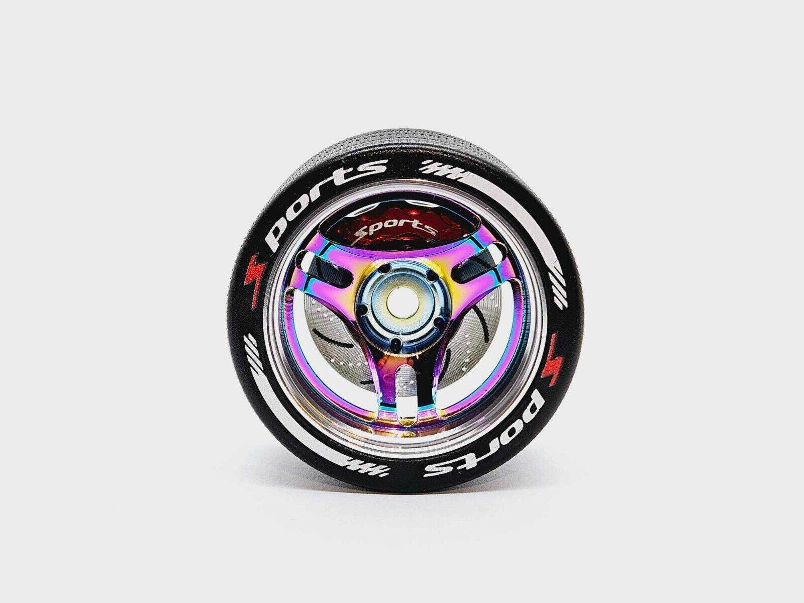 Close-up of the colourful RC transmitter steering wheel showing compatibility with major brands like SANWA, FUTABA, and FLYSKY