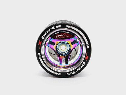 Close-up of the colourful RC transmitter steering wheel showing compatibility with major brands like SANWA, FUTABA, and FLYSKY