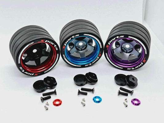 Close-up of the colorful RC transmitter steering wheel showing compatibility with major brands like SANWA, FUTABA, and FLYSKY