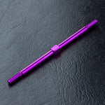 Close-up of MST Aluminium Turnbuckle 3x76mm in Red/Black #810016 for RC car suspension Purple