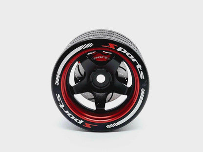 Close-up of the colorful RC transmitter steering wheel showing compatibility with major brands like SANWA, FUTABA, and FLYSKY