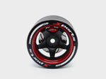 Close-up of the colorful RC transmitter steering wheel showing compatibility with major brands like SANWA, FUTABA, and FLYSKY