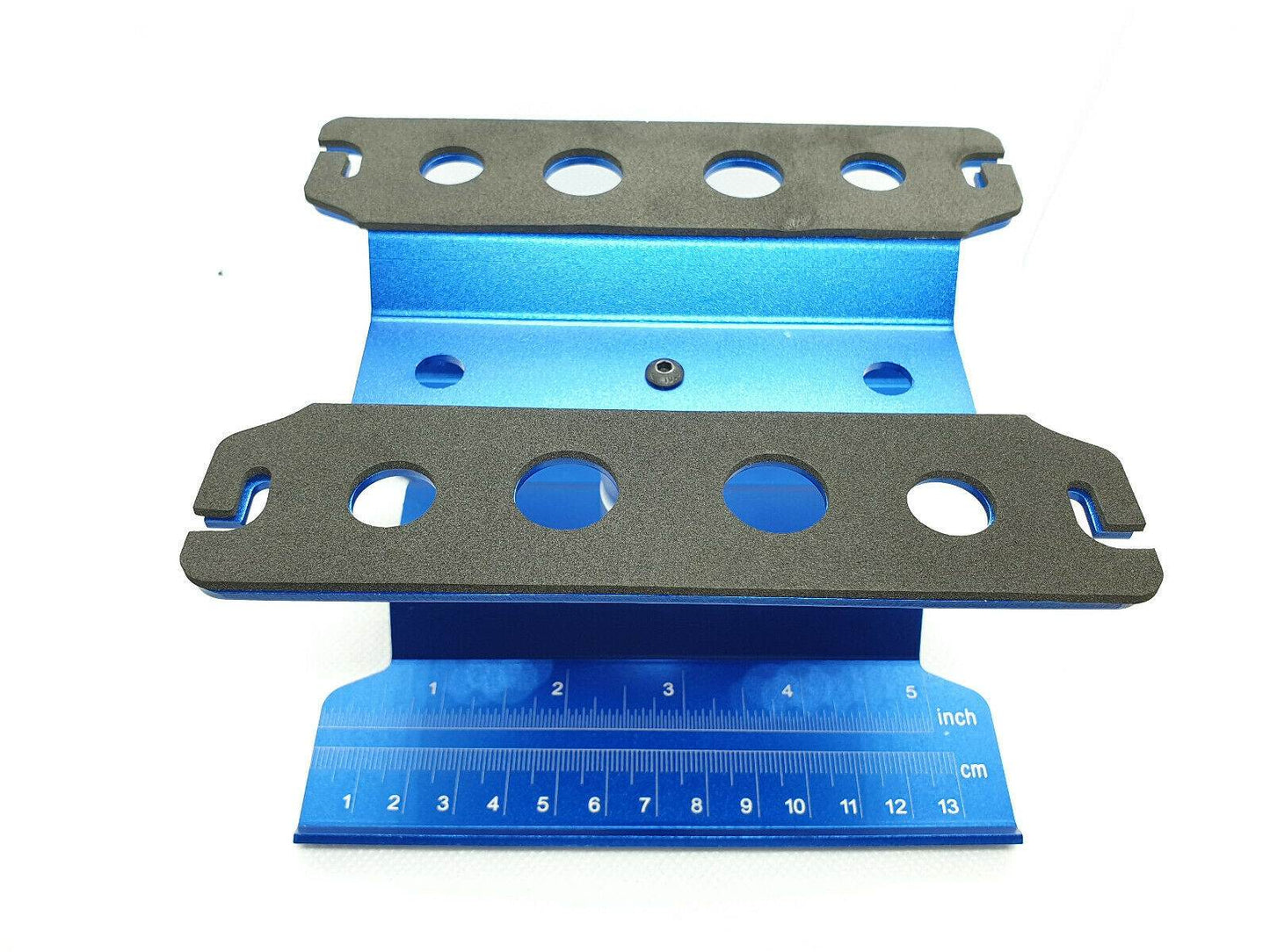 Close-up of the height-adjustable RC car stand, showcasing its sturdy construction and versatile use for 1/10 scale models - blue