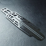 Close-up of MST RMX 2.5 Carbon Lower Chassis Deck, showcasing its flexible design, #210656