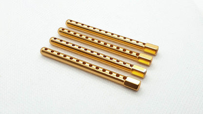 Close-up of 1/10 scale RC aluminium body shell post set, 60mm, in assorted colours - gold
