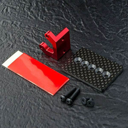 Close-up of MST RMX 2.0/2.5 Carbon ESC Mounting Plate #210639 for secure and lightweight ESC mounting