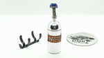 Close-up of aluminium 1/10 scale RC NOS bottle, designed as a balance weight for enhanced vehicle stability - silver