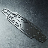 Close-up of MST RMX 2.5 Carbon Lower Chassis Deck, showcasing its flexible design, #210656