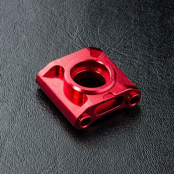 Close-up of MST RMX 2.0 Aluminium Bevel Gear Mount Bracket #210600 for RC drift performance