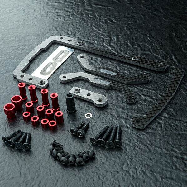 Close-up of MST Carbon Shorty Battery Mount Set #210637, lightweight and durable for RC car battery positioning