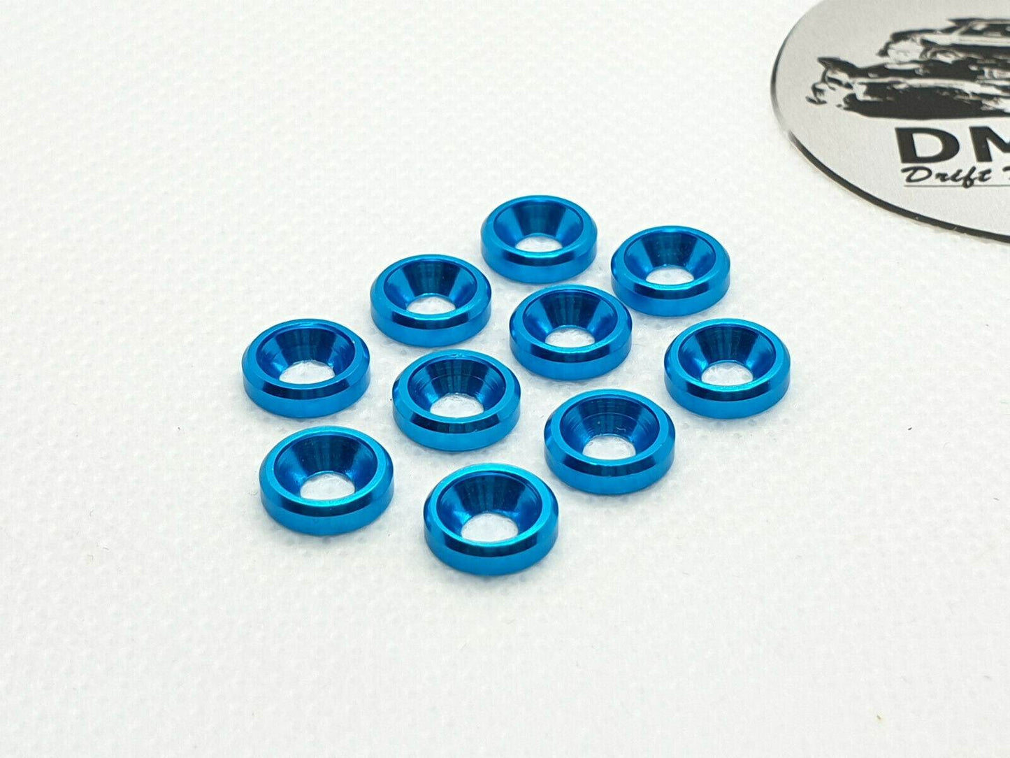 10-piece set of M3 aluminium countersunk gasket washers, designed for secure and flush screw fittings in RC cars