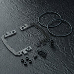 Close-up of MST Carbon Fibre Battery Mount Set, enhancing battery stability and performance, #210641