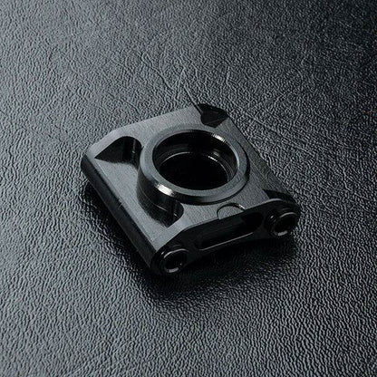Close-up of MST RMX 2.0 Aluminium Bevel Gear Mount Bracket #210600 for RC drift performance