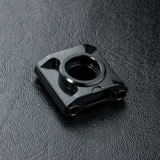 Close-up of MST RMX 2.0 Aluminium Bevel Gear Mount Bracket #210600 for RC drift performance